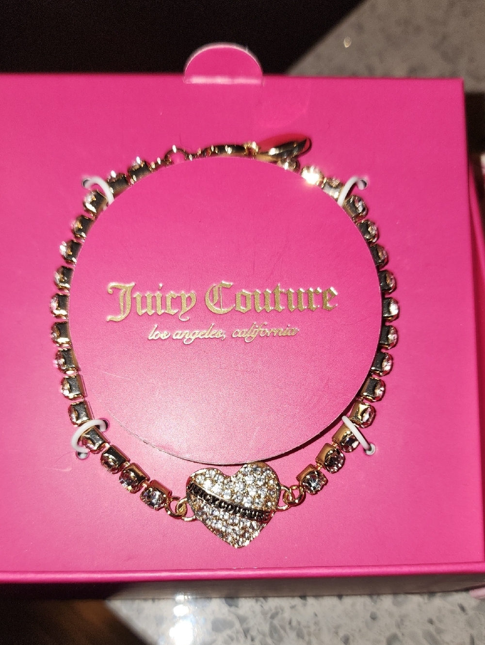 Juicy Couture Gold-Tone Crystal Heart Tennis Bracelet with Pink Heart Accent